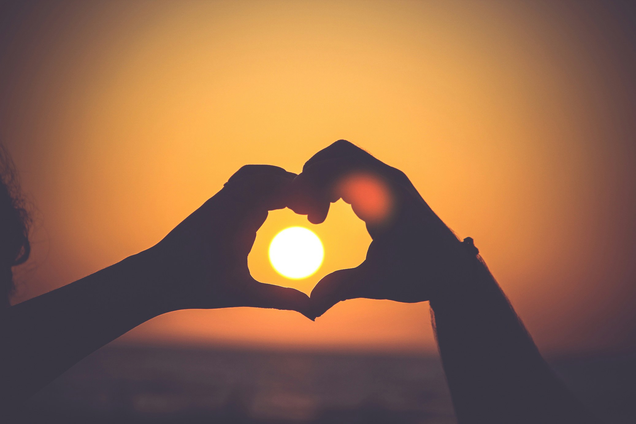 near-death experience transformation — couple embracing, presence over achievement